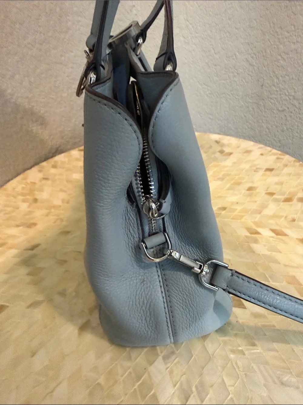 Kate Spade pale blue pebbled leather satchel with charm